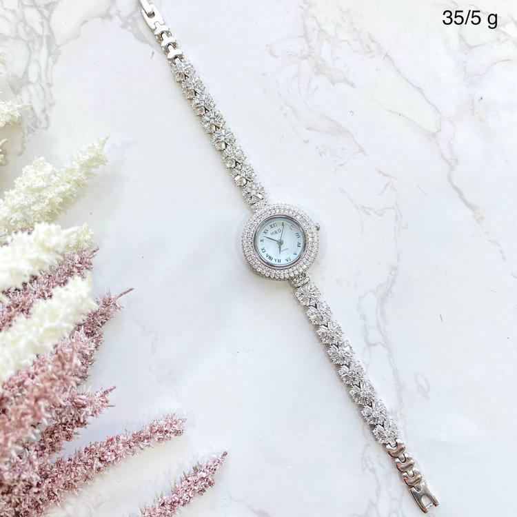 ساعت نقره زنانه صفحه گرد نگین باگت