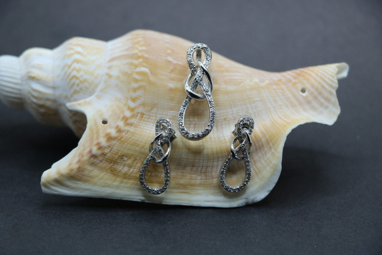 نیم ست نقره زنانه گره نگین میکرو